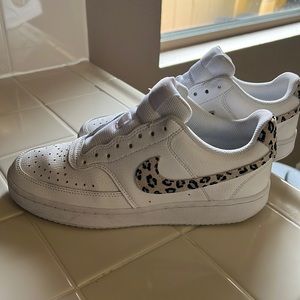 Nikes with cheetah swoosh, just need shoelaces